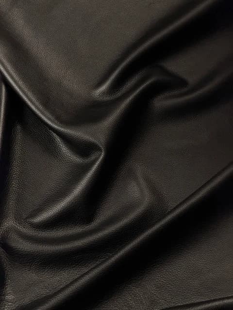 Black full-grain leather with a natural pebbled grain